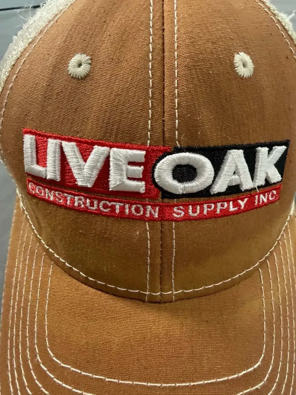 Oak Construction Supply Husqvarna Trucker Hat Brown Tan Snapback Cap